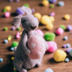 Felt bunny holding a felt egg