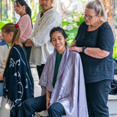Student enjoying a shoulder massage