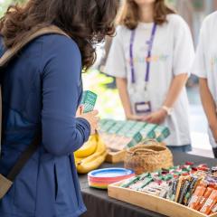 Student looking at a spread of muesli and energy bars