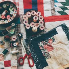 sewing supplies and quilt