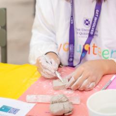 Student making clay art